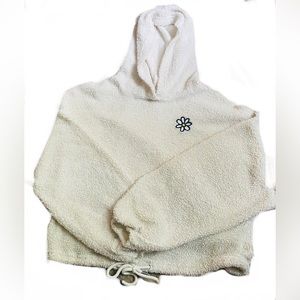 A crop hoodie in juniors it’s good quality and very soft and a warm white color